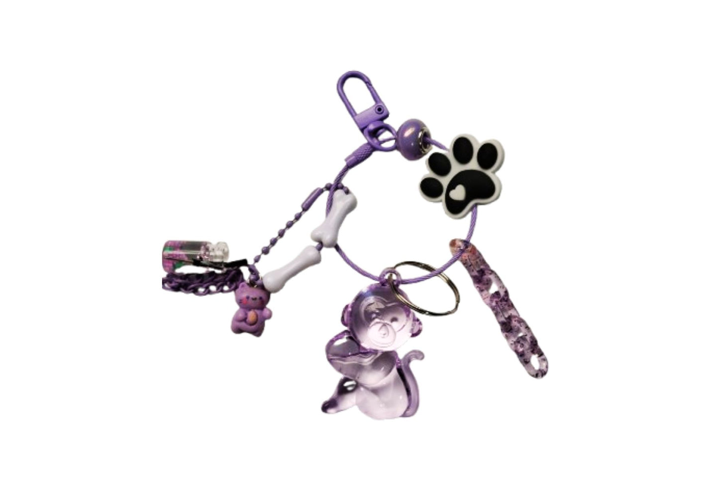 Bag Charm Monito Lila – Dulzura y Diversión en tu Estilo